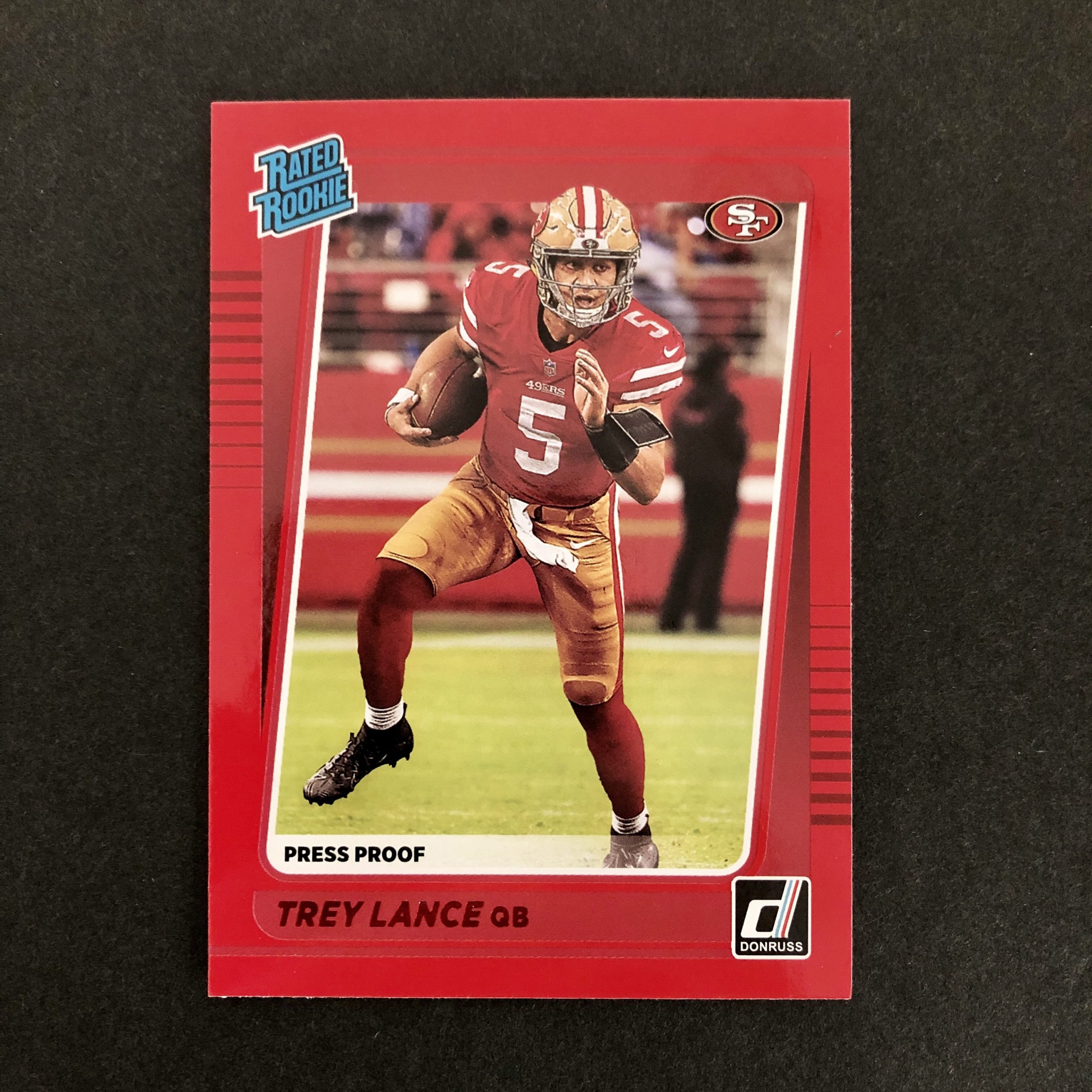 Trey Lance 2021 Donruss Mint Rated Rookie Card #254 picturing this #3 Overall San Francisco 49ers pick in his Red Jersey 